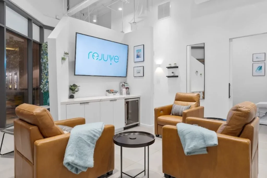 rejuve clinic reception area with leather chairs